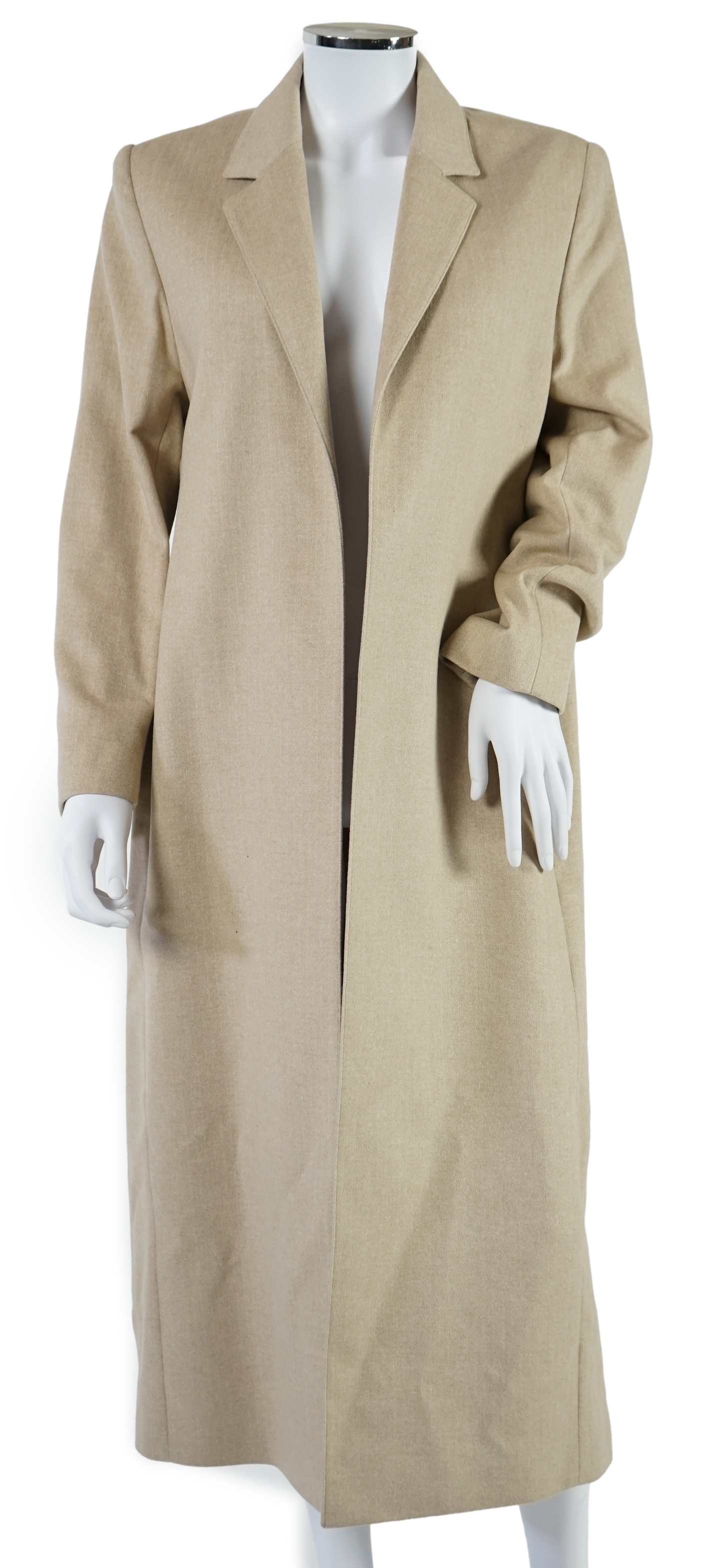 Two Louise Kennedy lady's suits: black with trousers and skirt, taupe long jacket with trousers. Approx size 14 Proceeds to Happy Paws Puppy Rescue